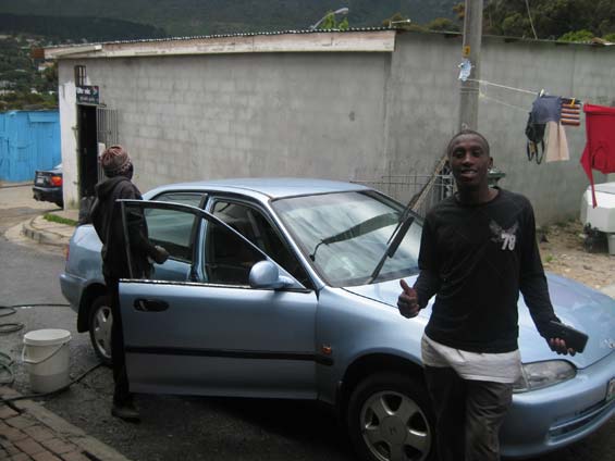 Car cleaners inside Imizamo Yethu